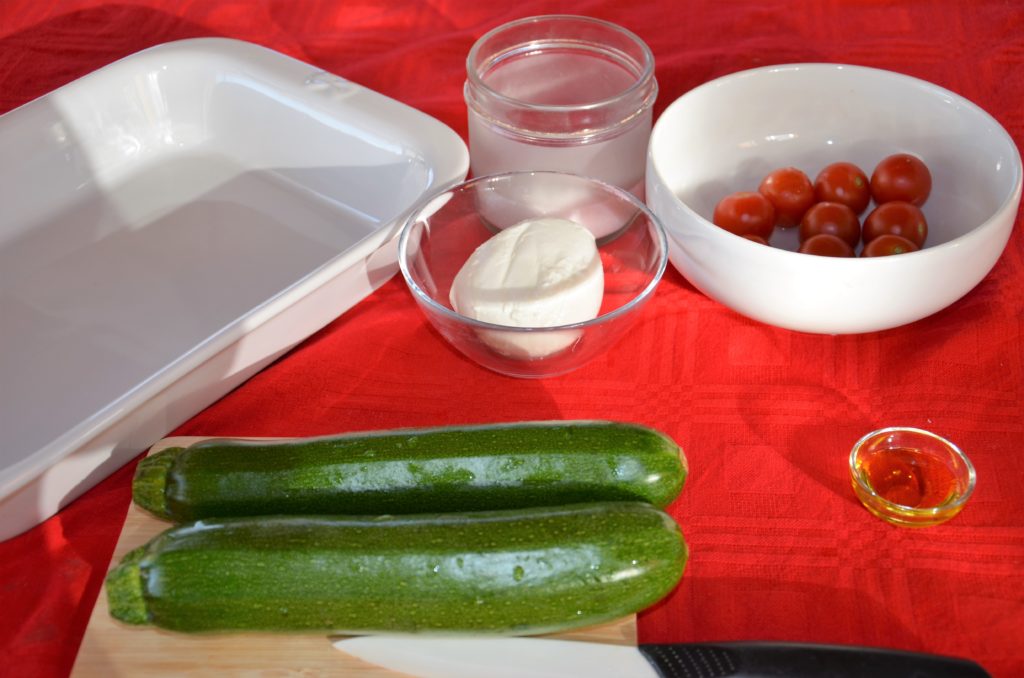 foto zucchine ripiene pomodoro e mozzarella